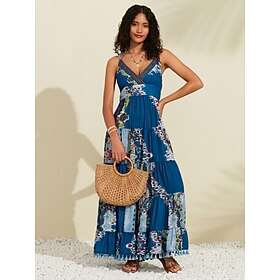 Foto: Dames slipdress maxi jurk blauw spaghettiband opdrukken kwastje zoom geweven lente zomer cross front